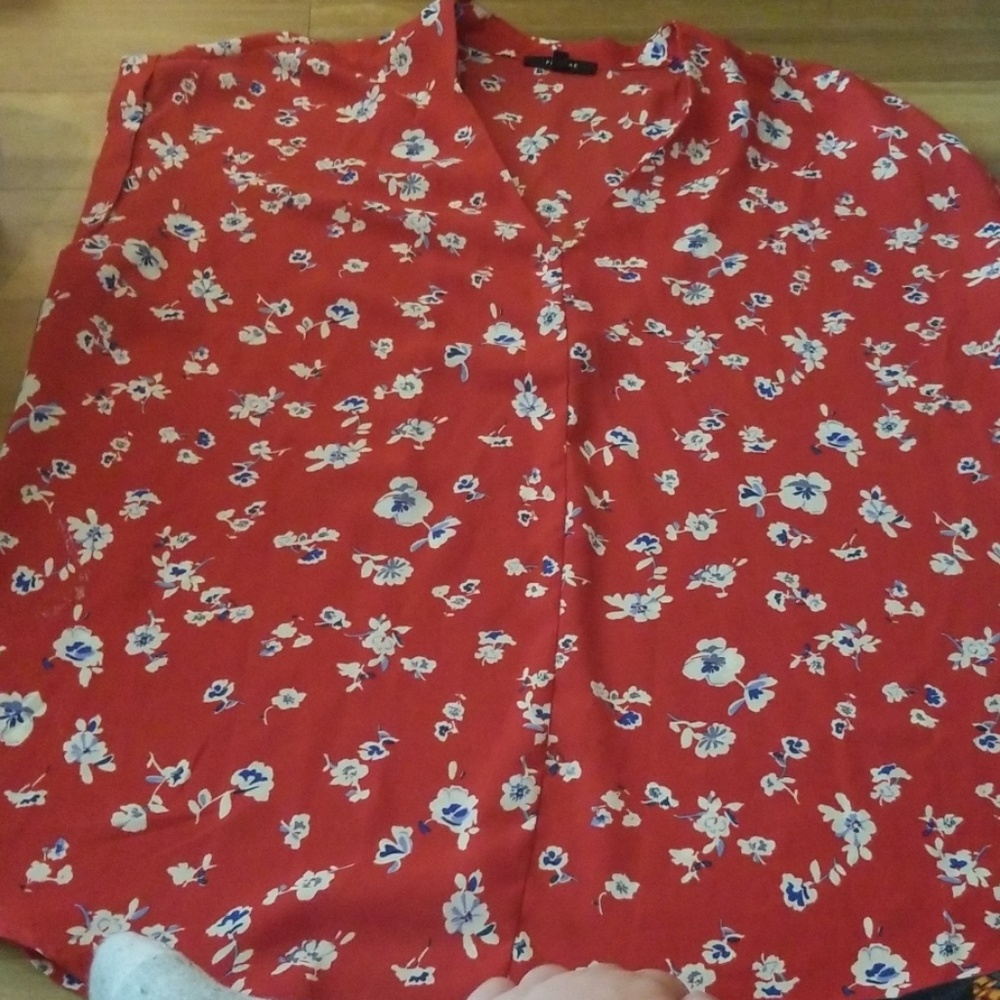 Red blouse with white & blue flowers